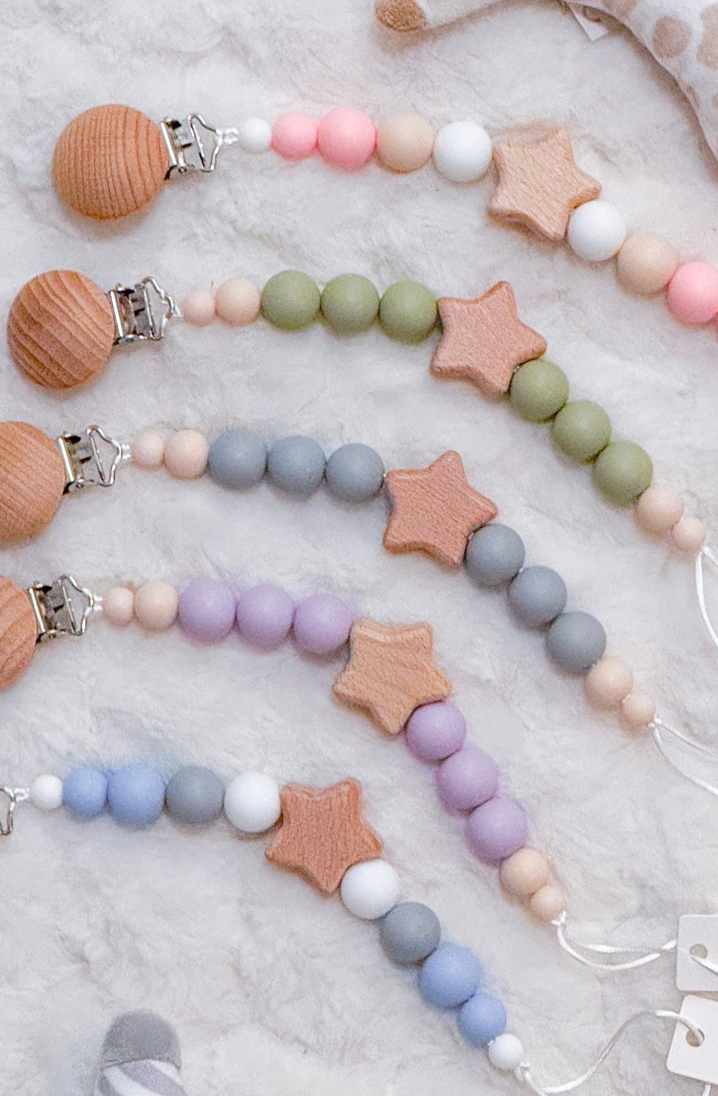 Outseam Pacifier Clip Stars in Pink — handmade pacifier holder